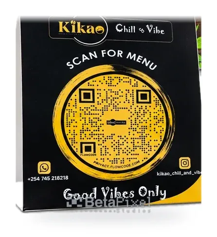 Black and yellow table tent card with a large scan-for-menu QR code for a lounge