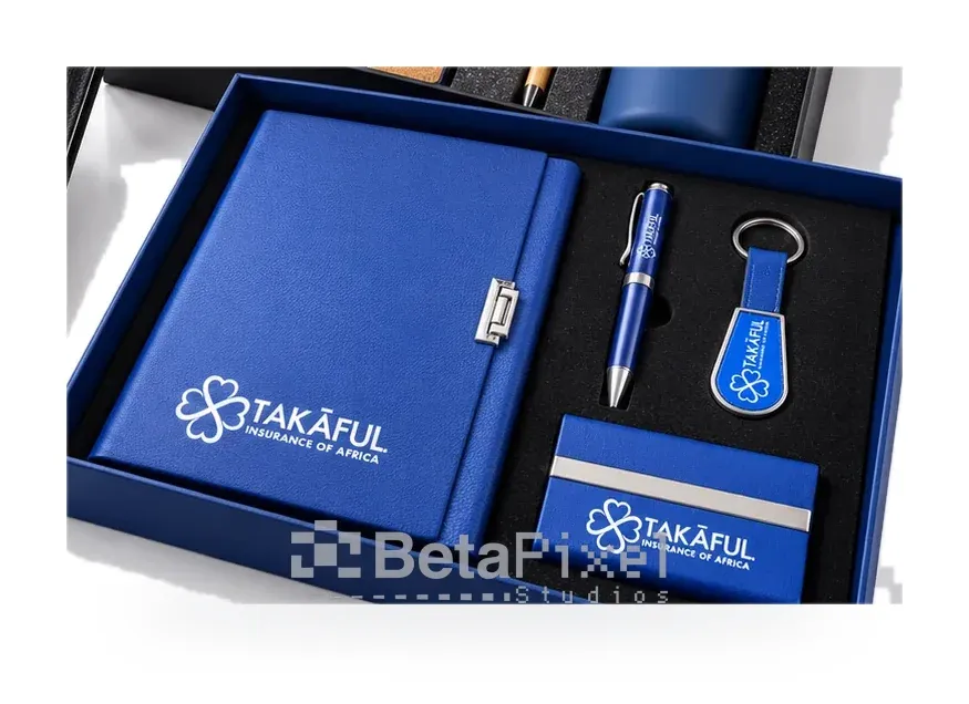 Blue corporate gift set with a branded notebook, metal pen, keyring and card holder in a fitted box
