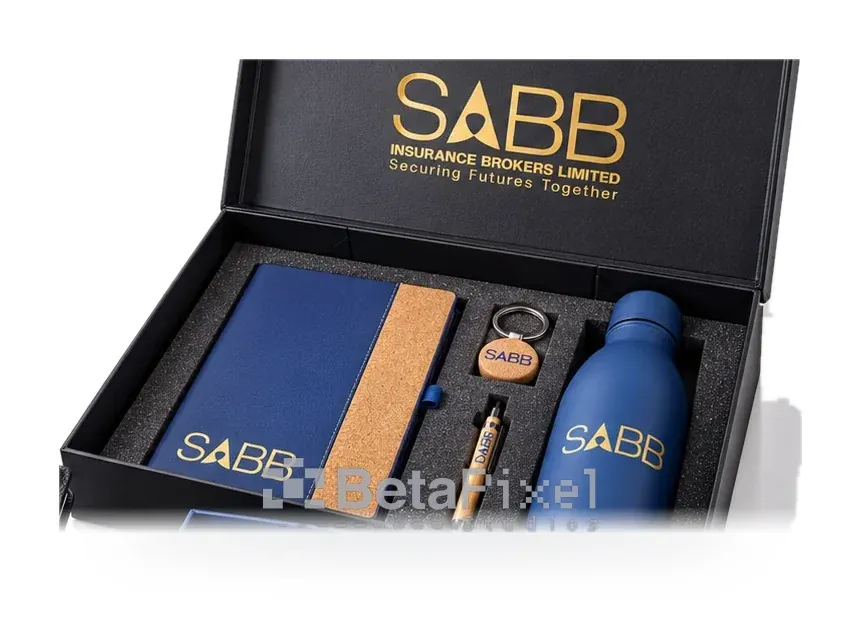 Black executive gift box with a gold-printed lid, navy notebook, pen, keyring and water bottle