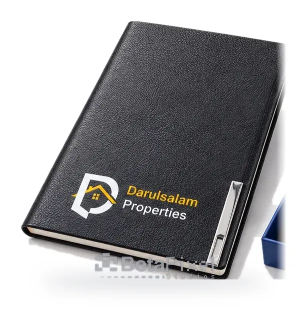 Black leather A5 notebook with a full-colour property company logo and a metal pen clip