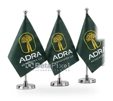 Three green desk flags on chrome stands for a law firm