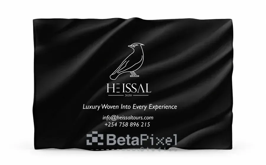 Black printed fabric flag for a luxury tour company with a white bird logo, tagline and contacts