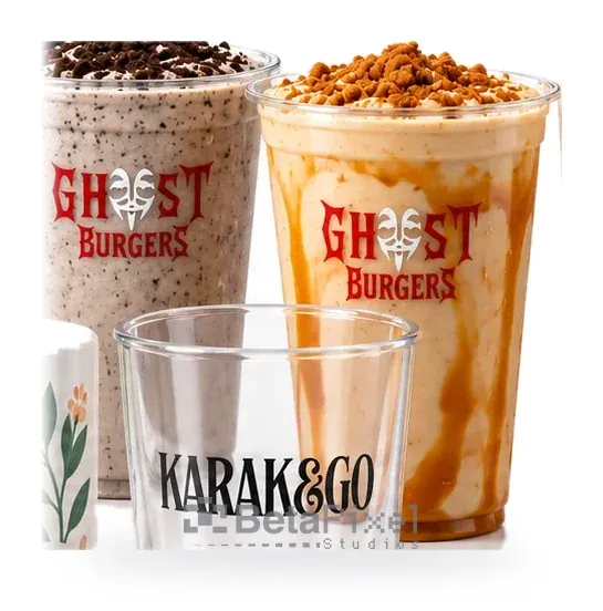 Milkshake cups and a clear glass printed with restaurant and café logos