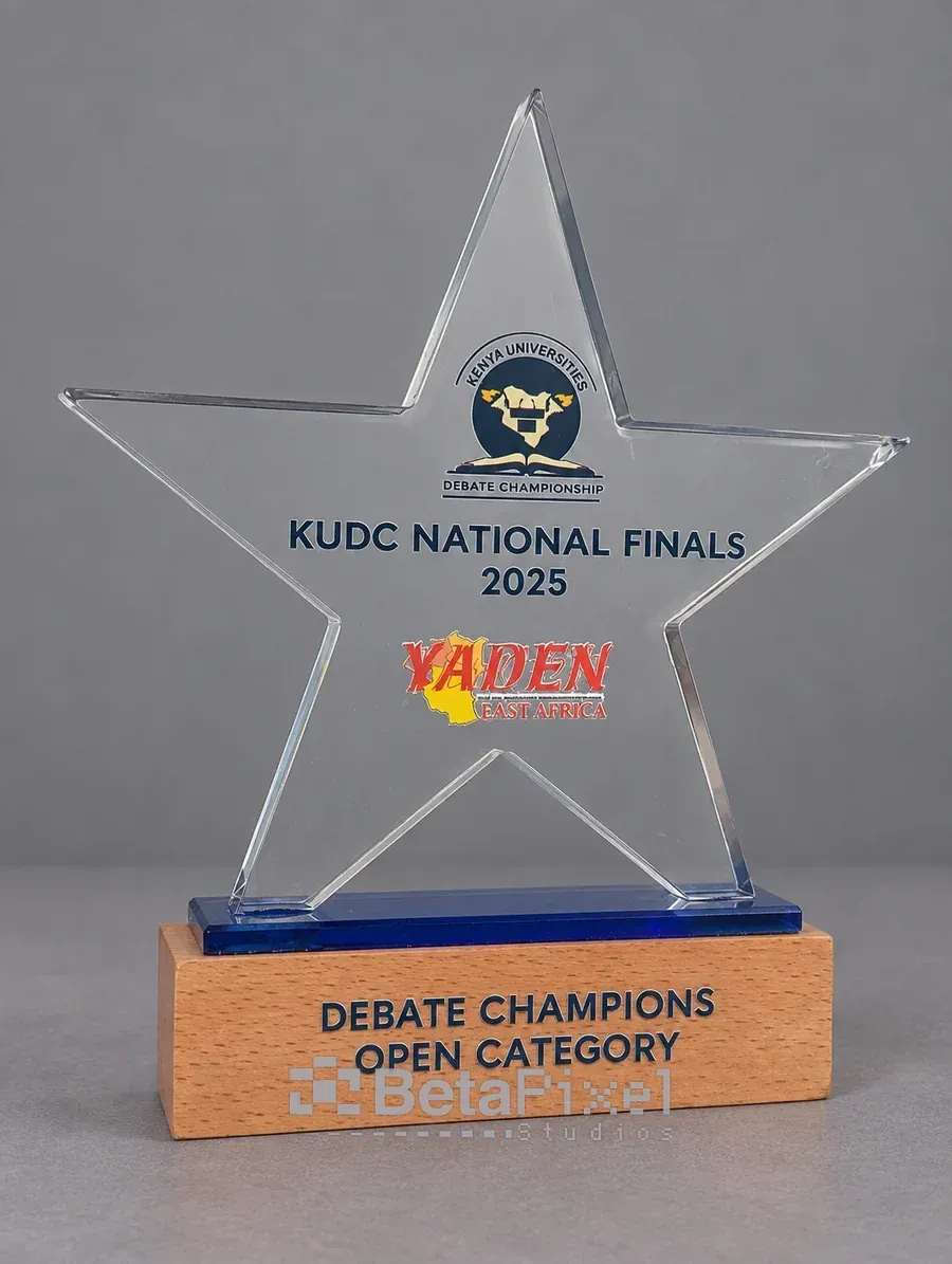 Clear acrylic star award with a full-colour UV DTF championship logo and a wooden base branded for debate champions